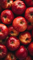 Wall Mural - A vibrant close-up image that captures the freshness and detailed textures of red apples filling the entire frame