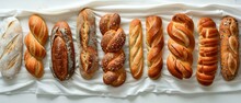 A Panoramic View Of Various Breads Lined Up Each Type
