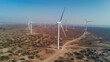 A panoramic view of a wind farm with turbines generating clean energy, highlighting the importance of renewable energy sources on Earth Day