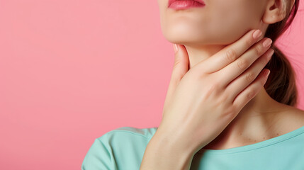 Wall Mural - Woman's hands touch her neck. Concept of thyroid disease or sore throat.