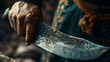 A close-up of a knife being sharpened, signifying the beginning of the ritual sacrifice in honor of Kurban Bayrami