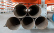 Pipes stack, straight copper. Industrial pieces of pipelines for conduit, factory or construction works