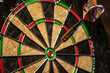 © Cool_Man - A dart lands perfectly centered in the bullseye