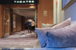 Entry to Show Lounge or large theatre with stage and seating  blue on modern cruiseship or cruise ship ocean liner