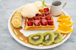 waffle with assorted fruits and icecream
