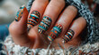 Close-up nail art with bohemian spirit earthy tones tribal patterns relaxed and adventurous mood. Glamour woman hand with nail polish on her fingernails. Nail art and design 