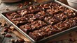 A tray of brownies with walnuts on top