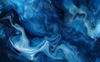 The image is a blue and white swirl of paint that looks like a galaxy