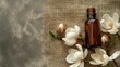 Magnolia essential oil on burlap background