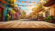 © ink drop - A blank rustic wooden table top with a colorful background of a blurred mexican street scene