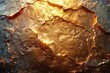 Close-up view of a weathered, hammered gold plate with a dented, aged texture for a realistic background.
