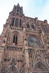 Wall Mural - France, Alsace, Strasbourg: View of Notre Dame cathedral with frame houses