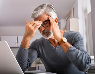 Poster - Senior man gray hair have headache when working on laptop computer at home