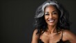 © Anastasiia - Mature Black woman with smooth skin and gray hair smiling happily. Concept Portrait Photography, Natural Beauty, Smiling Face, Silver Hair, Mature Elegance