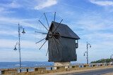 Fototapeta Boho - Old wooden windmill in the ancient town of Nessebar, Bulgaria.