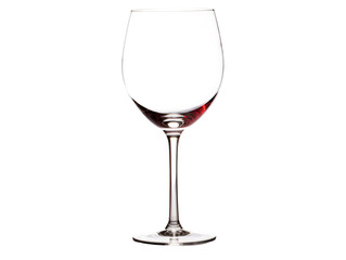 a wine glass with red liquid