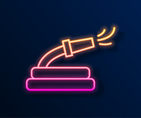 Wall Mural - Glowing neon line Garden hose icon isolated on black background. Spray gun icon. Watering equipment. Vector