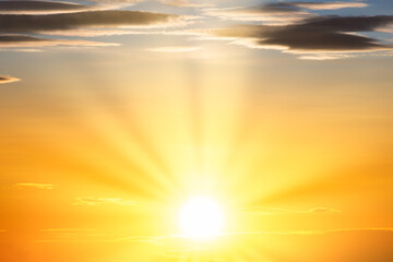 Wall Mural - sunset sky with sun light and sunset clouds background