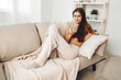 © SHOTPRIME STUDIO - Cozy Morning Bliss: Smiling Woman Holding Coffee Mug Indoors