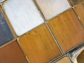 Wall Mural - the different colors of the salt pans seen from above