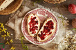 Two slices of traditional Czech sweet Easter cake called mazanec with butter and cranberry marmalade on a plate