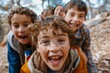 © Iigo - Group of kids having fun in the forest on a sunny day.