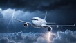 © realone952 - A flying passenger plane is struck by lightning at night during a thunderstorm.