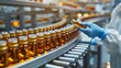 Pharmacist scientist inspecting medical vials on conveyor belt in pharmaceutical factory