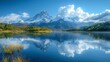 © fangphotolia - A serene lake framed by snow-capped peaks.Professional photographer perspective