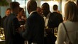 © Felippe Lopes - Colleagues networking at a formal business dinner