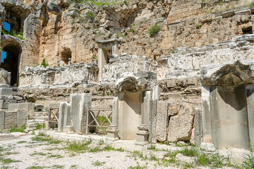 Wall Mural - Picturesque ruins of an amphitheater in the ancient city of Perge, Turkey. Perge open-air museum.