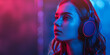 Portrait of beautiful young  woman listening to music with headphones. The image has a futuristic and colorful vibe.