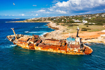 Wall Mural - Abandoned Edro III Shipwreck at seashore of Peyia, near Paphos, Cyprus. Historic Edro III Shipwreck site on the shore of the water in Cyprus. Aerial view of Shipwreck EDRO III, Pegeia, Paphos.