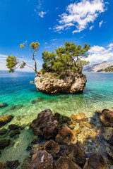 Wall Mural - Kamen Brela symbol of the city of Brela on Adriatic coast of Dalmatia, Croatia. Kamen Brela, tiny famous island in Brela, Makarska Riviera, Dalmatia, Croatia.