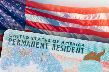 Green Card US Permanent resident card. Immigrant ID documents. USA Electronic Diversity Visa Lottery DV-2024 DV Lottery Results. United States of America. American flag on background. High resolution