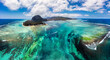 © daliu - Aerial view of Mauritius island panorama and famous Le Morne Brabant mountain, beautiful blue lagoon and underwater waterfall. Le Morne Brabant peninsula and Underwater Waterfall, Mauritius.