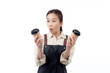 Cheerful young asian woman barista in casual work attire happily holding a takeaway coffee cup, isolated white background, joyful barista presenting takeaway coffee, small business or startup.
