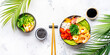 Balanced dier. Poke bowl with shrimp, rice, avocado, vegetables and chuka salad, white table background, top view