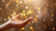 Hand holding three golden stars with a sparkling bokeh background, Concept of excellence, rating, and quality assurance in business and services.