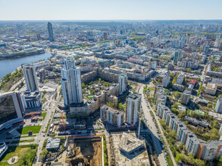 Yekaterinburg aerial panoramic view in spring at sunset. Yekaterinburg city and pond in spring or autumn.