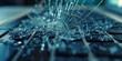 close up of a board, a shattered computer screen, with cracks radiating from the impact point, depicting the aftermath of a dropped or mishandled laptop, with fragments of glass scattered across the k