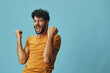 © SHOTPRIME STUDIO - Man happy background person winner caucasian young fun portrait guy success expression gesture