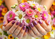 female hands with many flowers. floral background card