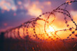 Barbed wire fence in the sunset sky background. Paper cutout style. In sharp focus, closeup. High resolution. The concept of security and protection from townspeople or production workers at industria