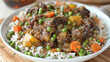 Authentic jamaican oxtail stew with butter beans, served over rice with carrots and green peas, showcasing caribbean cuisine flavors