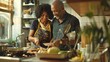 © Julia Jones - Mature Couple Cooking Together in Home Kitchen