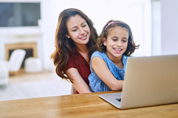 Canvas Print - Happy, mother and young girl with laptop for remote education, learning and child development at home, Excited, mom and kid with computer on table for study, homework and teaching motor skills