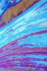 Wall Mural - Abstract nature background. Top view of the bottom of a dry estuary. Colorful ground texture