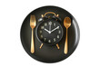 © K2Kstock - The alarm clock on a black plate with fork and knife isolated on a transparent background