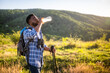 © inesbazdar - Young man enjoys  hiking and drinking energy drink.